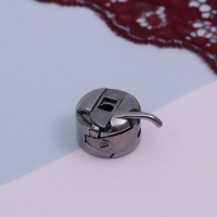 Шпульный колпачок к БШМ, левый, 3 × 2,5 × 1,5 см Шпульный колпачок к БШМ, левый, 3 × 2,5 × 1,5 см