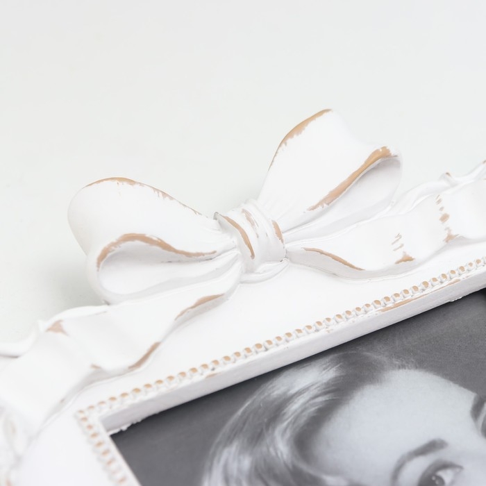 Фоторамка полистоун 10х15 см Фоторамка полистоун 10х15 см "Бант" белая 14х20,5 см