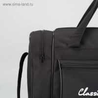 Сумка спортивная на молнии, 4 наружных кармана, длинный ремень, средний размер, цвет чёрный Сумка спортивная на молнии, 4 наружных кармана, длинный ремень, средний размер, цвет чёрный