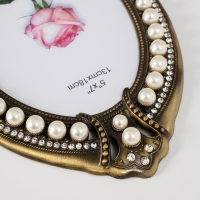 Фоторамка металл, стекло 13х18 см "Нега" латунь, стразы, жемчужины 1,7х17,3х25 см Фоторамка металл, стекло 13х18 см "Нега" латунь, стразы, жемчужины 1,7х17,3х25 см