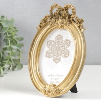 Фоторамка полистоун 10х15 см "Бант и медальон" состаренное золото 21х14 см Фоторамка полистоун 10х15 см "Бант и медальон" состаренное золото 21х14 см