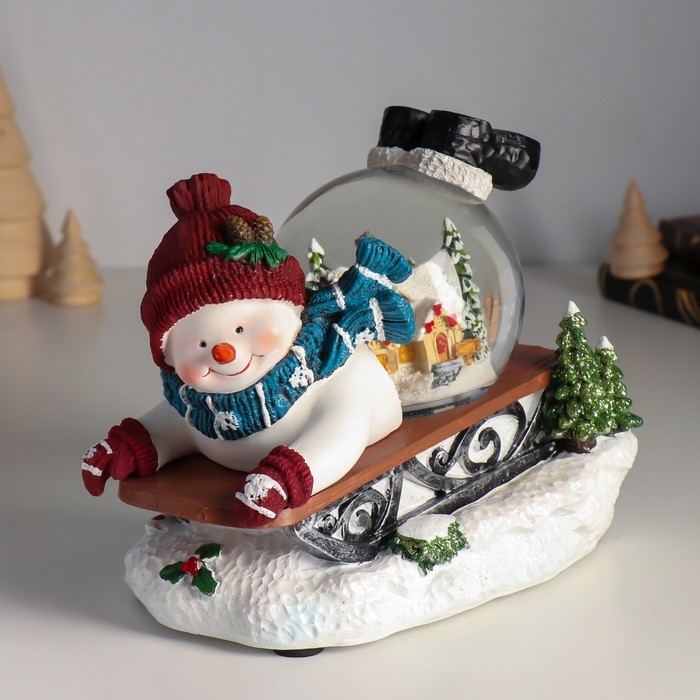 Сувенир полистоун водяной шар музыка, свет Сувенир полистоун водяной шар музыка, свет "Снеговик на санках" d=10 см 22х14х17,5 см