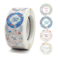 Наклейка бумага "Благодарим" d=2,5 см 500 шт в рулоне 3х6х6см Наклейка бумага "Благодарим" d=2,5 см 500 шт в рулоне 3х6х6см