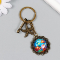 Брелок металл, стекло с карабином "Морская звезда и рыбки в медальоне" бронза 9,5 см Брелок металл, стекло с карабином "Морская звезда и рыбки в медальоне" бронза 9,5 см