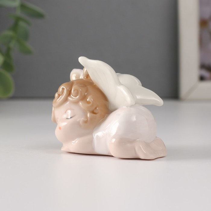 Сувенир керамика "Малышка-ангел с бантиком спит" 6х4х5 см