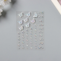 Наклейка пластик стразы "Полёт бабочки" белая 11х7,8 см Наклейка пластик стразы "Полёт бабочки" белая 11х7,8 см