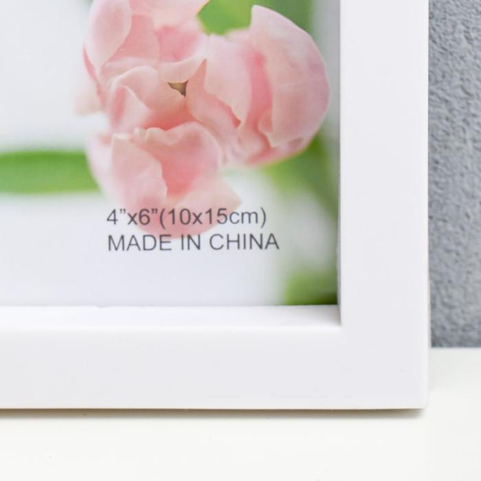 Фоторамка пластик на 6 фото 10х15 см Фоторамка пластик на 6 фото 10х15 см "Плоская" белая 44х27,5 см