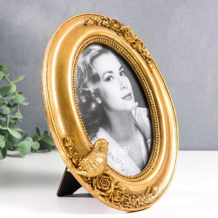 Фоторамка полистоун 10х15 см овальная Фоторамка полистоун 10х15 см овальная "Золотая птичка и розы" золото 20х15,5 см