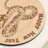 Новый год. Подставка с символом года под горячее "Змея", диаметр - 9,5 см Новый год. Подставка с символом года под горячее "Змея", диаметр - 9,5 см