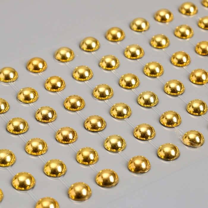 Наклейка пластик стразы Наклейка пластик стразы "Полужемчужины" d-10 мм золото 10х27 см