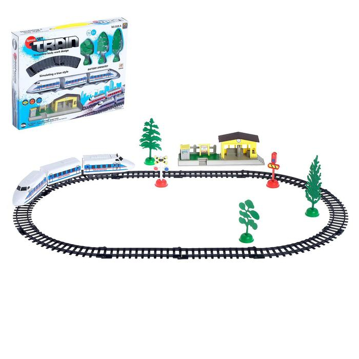 Железная дорога «Электропоезд», работает от батареек, в комплекте: деревья, знаки и станция Железная дорога «Электропоезд», работает от батареек, в комплекте: деревья, знаки и станция