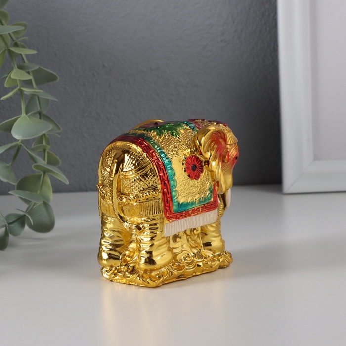 Нэцке полистоун "Индийский слон на золотых слитках" золото 4,6х8,8х8 см