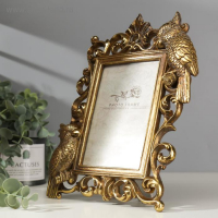 Фоторамка полистоун 10х15 см "Попугаи" состаренное золото 26,5х20,5 см Фоторамка полистоун 10х15 см "Попугаи" состаренное золото 26,5х20,5 см