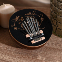 Сувенирный музыкальный инструмент "Калимба узор" круглая 7х14х14 см Сувенирный музыкальный инструмент "Калимба узор" круглая 7х14х14 см