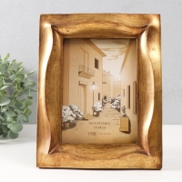 Фоторамка полистоун 13х18 см "Волна" золото 19,8х3х24,4 см Фоторамка полистоун 13х18 см "Волна" золото 19,8х3х24,4 см