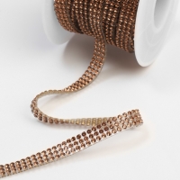 Стразы термоклеевые, d = 2 мм, ширина - 7 мм, 4,5 &plusmn; 0,5 м, цвет бронзовый