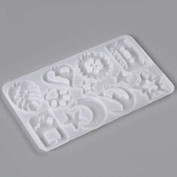 Форма силиконовая универсальная для создания сережек, кулонов, брелков - 12 шт. Форма силиконовая универсальная для создания сережек, кулонов, брелков - 12 шт.