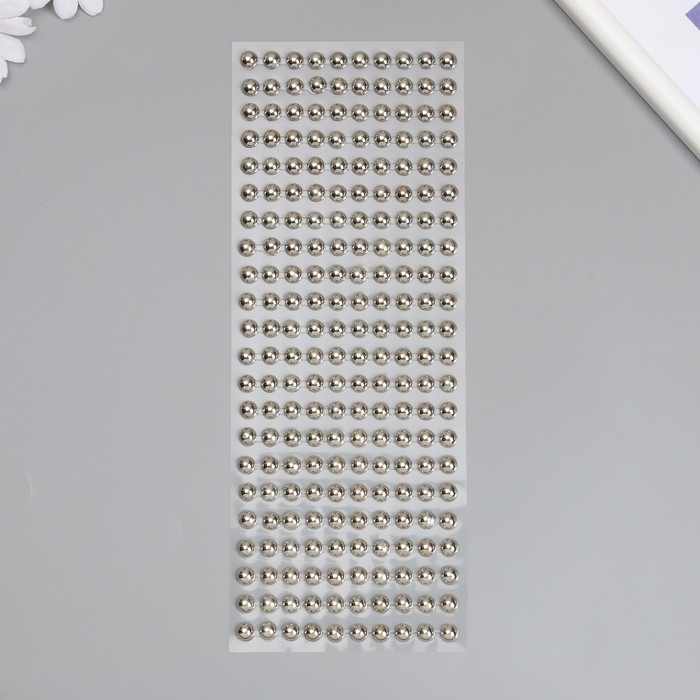 Наклейка пластик стразы Наклейка пластик стразы "Полужемчужины" d-8 мм серебро 10х27 см