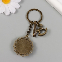 Брелок металл, стекло с карабином "Лошадка-качалка и малышка в медальоне" бронза 9,5 см Брелок металл, стекло с карабином "Лошадка-качалка и малышка в медальоне" бронза 9,5 см