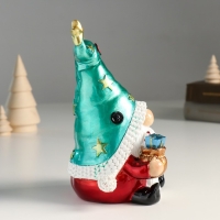Сувенир полистоун "Дед Мороз в колпаке со звёздами, с колоколом и мешком" 12х9,5х18 см
