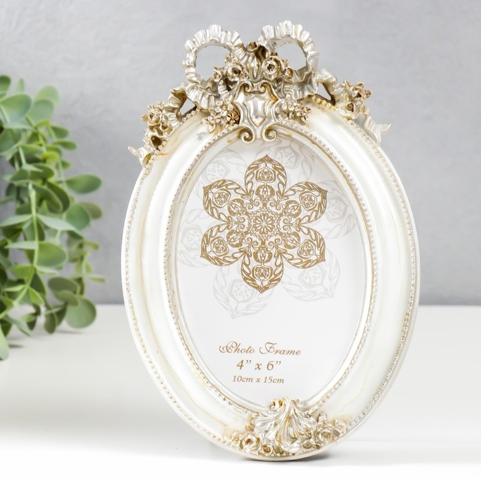 Фоторамка полистоун 10х15 см Фоторамка полистоун 10х15 см "Бант и медальон" белая с золотом 21х14 см