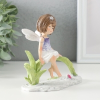 Сувенир полистоун "Малышка в сиреневом платье с крыльями, сидит у пруда" 12,5х8х12 см Сувенир полистоун "Малышка в сиреневом платье с крыльями, сидит у пруда" 12,5х8х12 см