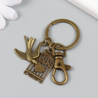 Брелок металл с карабином "Птица и клетка с сердцем" бронза 6,3 см Брелок металл с карабином "Птица и клетка с сердцем" бронза 6,3 см