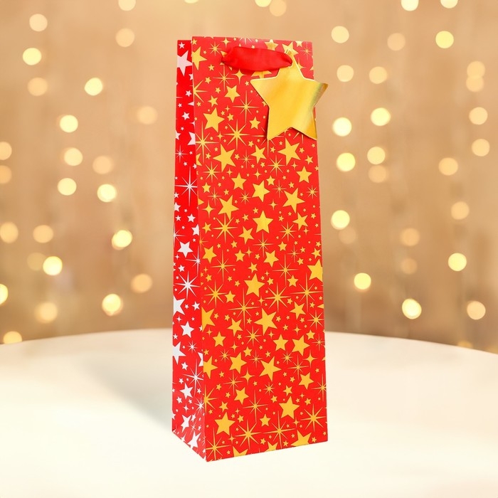Новый год. Пакет подарочный новогодний под бутылку, упаковка Новый год. Пакет подарочный новогодний под бутылку, упаковка "Звездочки", 12 х 36 х 8,5 см.