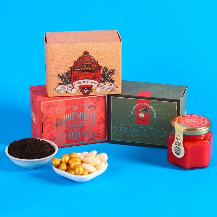 Подарочный набор «Волшебного нового года»: чай чёрный 50 г., арахис в белой шоколадной глазури 100 г., ананас в белом шоколаде 100 г., крем-мед с клубникой 120 г. Подарочный набор «Волшебного нового года»: чай чёрный 50 г., арахис в белой шоколадной глазури 100 г., ананас в белом шоколаде 100 г., крем-мед с клубникой 120 г.