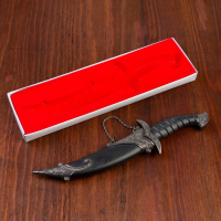 Сувенирный нож изогнутый, 26,5 см, на ножнах длинный завиток, чёрный Сувенирный нож изогнутый, 26,5 см, на ножнах длинный завиток, чёрный