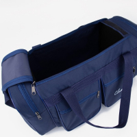 Сумка спортивная на молнии, 4 наружных кармана, длинный ремень, средний размер, цвет синий Сумка спортивная на молнии, 4 наружных кармана, длинный ремень, средний размер, цвет синий