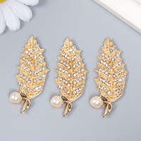 Декор для творчества металл, пластик "Листик с жемчужинкой и стразами" золото 5,5х2,2 см Декор для творчества металл, пластик "Листик с жемчужинкой и стразами" золото 5,5х2,2 см