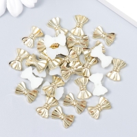 Декор для творчества пластик "Бантики" золото набор 30 шт 0,9х1,3 см