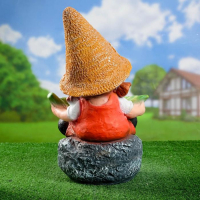 Садовая фигура "Девочка на камне с листом" 48х29см Садовая фигура "Девочка на камне с листом" 48х29см