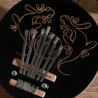 Сувенирный музыкальный инструмент "Калимба узор" круглая 7х14х14 см Сувенирный музыкальный инструмент "Калимба узор" круглая 7х14х14 см