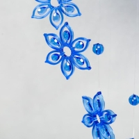 Музыка ветра пластик "Цветок" 4 трубочки + 11 фигурок Музыка ветра пластик "Цветок" 4 трубочки + 11 фигурок