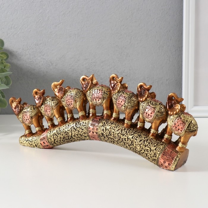 Сувенир полистоун "Семь африканских слонов в золотой, ажурной попоне" 10,7х29х4 см