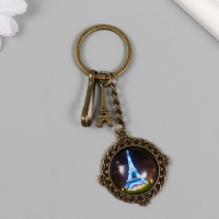 Брелок металл, стекло с карабином "Эйфелева башня и медальон" бронза 9,5 см Брелок металл, стекло с карабином "Эйфелева башня и медальон" бронза 9,5 см