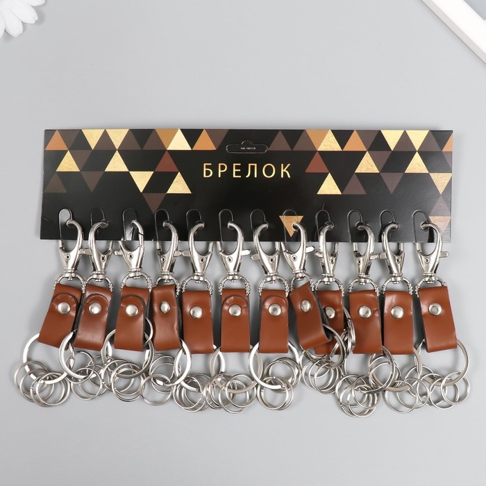 Брелок металл кожзам с карабином коричневый/черный 12х3,4 Брелок металл кожзам с карабином коричневый/черный 12х3,4