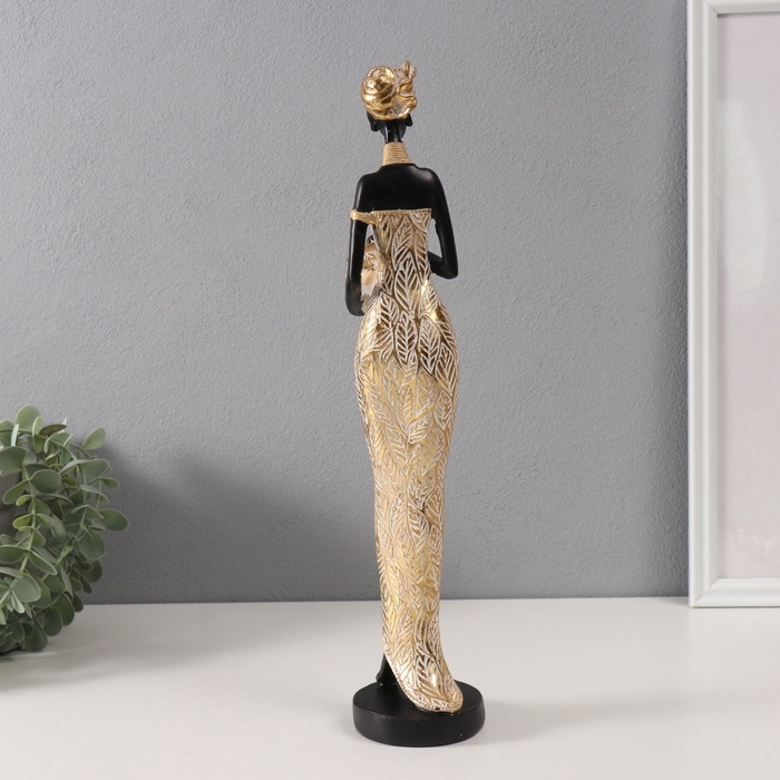 Сувенир полистоун "Африканка в платье с листьями, с горшком" золото 8,5х8х39 см