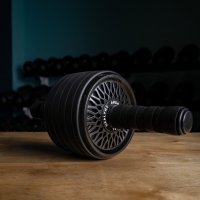 Ролик для пресса ONLYTOP, 34х13х13 см, с ковриком, цвет чёрный