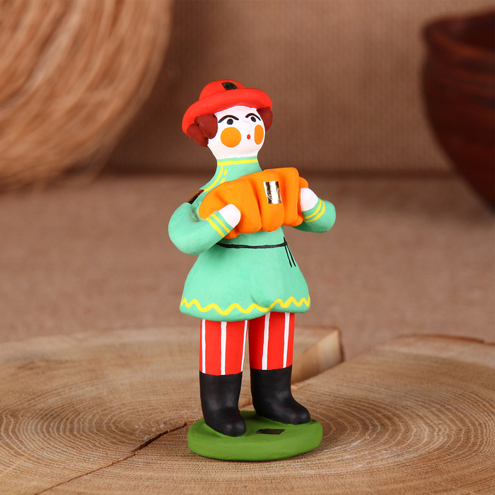 Дымковская игрушка Дымковская игрушка "Мужик стоячий с гармошкой"