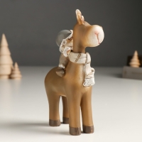 Сувенир полистоун "Малыш в шапке-ушанке верхом на лосике" беж 6х11х14 см