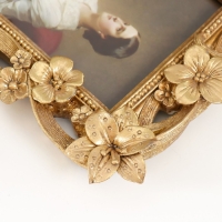 Фоторамка полистоун 10х15 см "Цветочная нежность" золото 23х18х2 см Фоторамка полистоун 10х15 см "Цветочная нежность" золото 23х18х2 см