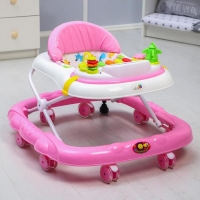 Ходунки &laquo;Улыбка&raquo;, 8 силик. колес, съемная панель, муз., свет, игрушки, розовый