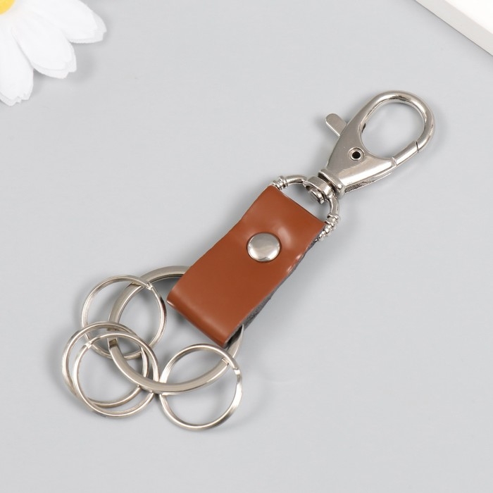 Брелок металл кожзам с карабином коричневый/черный 12х3,4 Брелок металл кожзам с карабином коричневый/черный 12х3,4