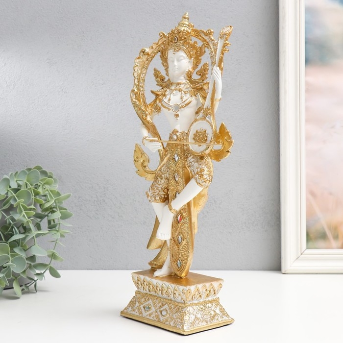 Сувенир полистоун Сувенир полистоун "Танцующее божество с музыкальным инструментом" бело-золотой 13х9х34 см