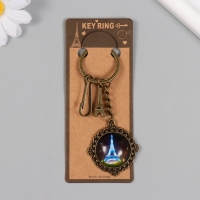 Брелок металл, стекло с карабином "Эйфелева башня и медальон" бронза 9,5 см Брелок металл, стекло с карабином "Эйфелева башня и медальон" бронза 9,5 см