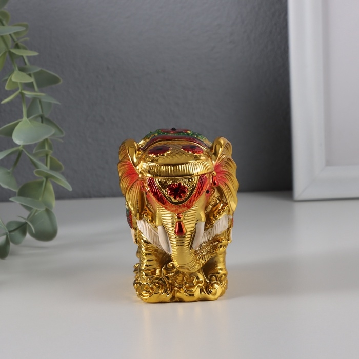 Нэцке полистоун "Индийский слон на золотых слитках" золото 4,6х8,8х8 см