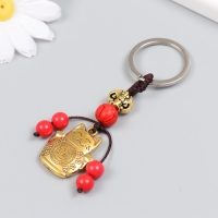 Брелок "Манэки-нэко" под золото 9х3х0,8 см Брелок "Манэки-нэко" под золото 9х3х0,8 см